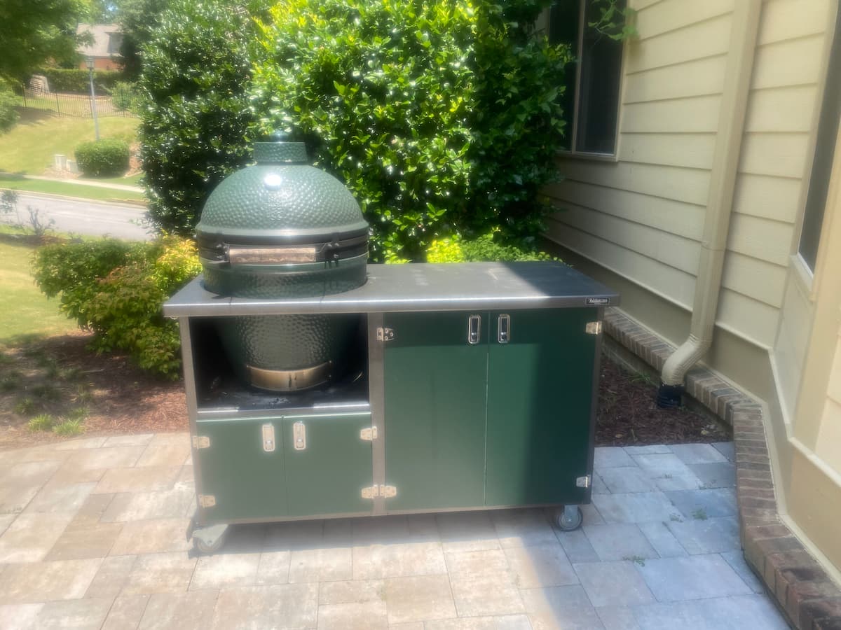 Big Green Egg ceramic grill in Alpha Series grill cabinet by Wellspring